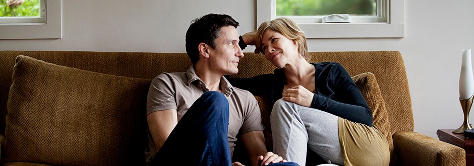 Couple sitting on a couch together